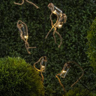 Садовая гирлянда 10 подсвечиваемых  светодиодами бутылочек ЭРА ERAGS08-05 в интернет гипермаркете «Планета Лета». Фото